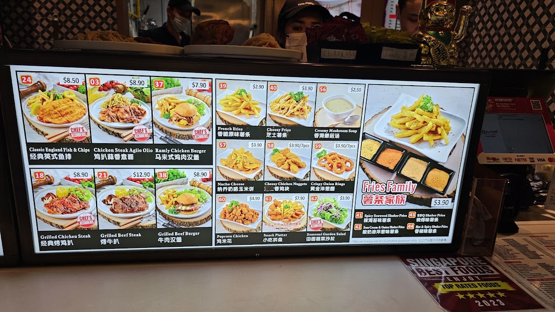 A digital menu board displaying various main courses, sides, and fries options with prices at Kopitiam Food Hall.