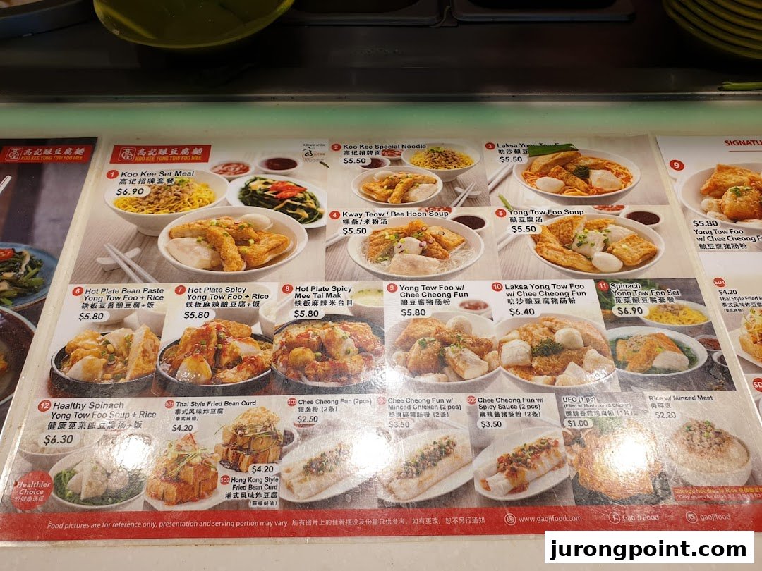 A vibrant menu display from Koo Kee Yong Tow Foo, showcasing various Yong Tow Foo dishes and prices.