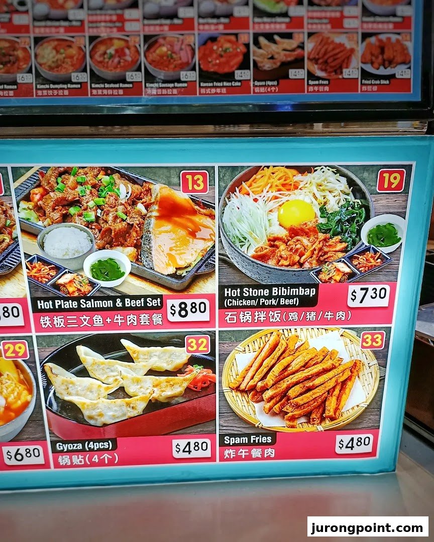 A vibrant menu board displaying various Korean and Asian dishes with prices and images.