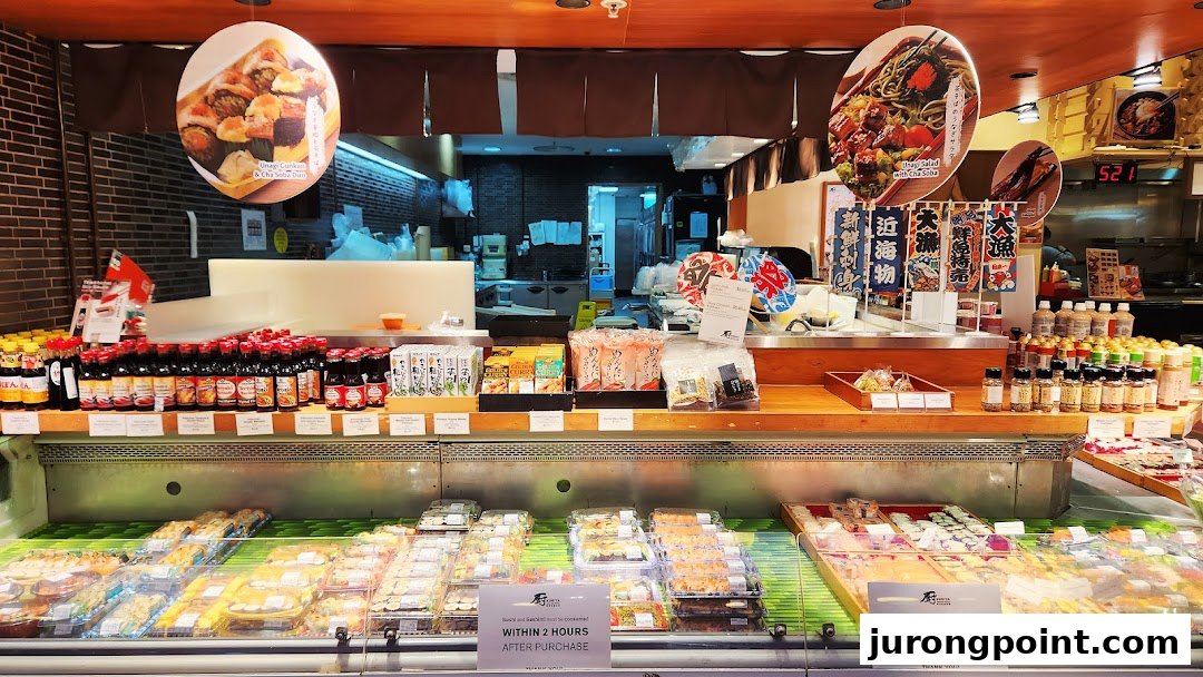 A vibrant display of fresh sushi, Japanese groceries, and sauces at Kuriya Japanese Market.