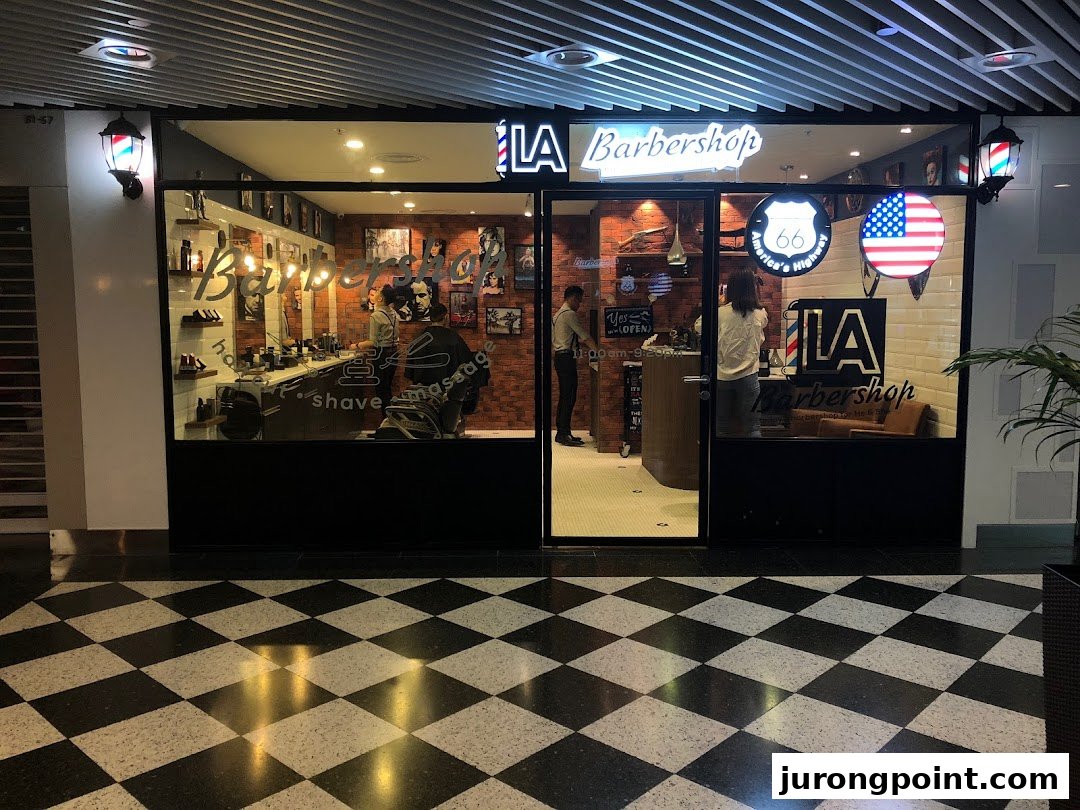 Exterior view of LA Barbershop, showcasing its classic American-themed interior and entrance.