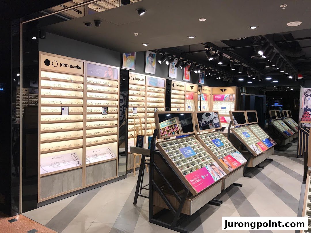 Interior view of a Lenskart store showcasing a wide array of eyeglasses on modern display units.