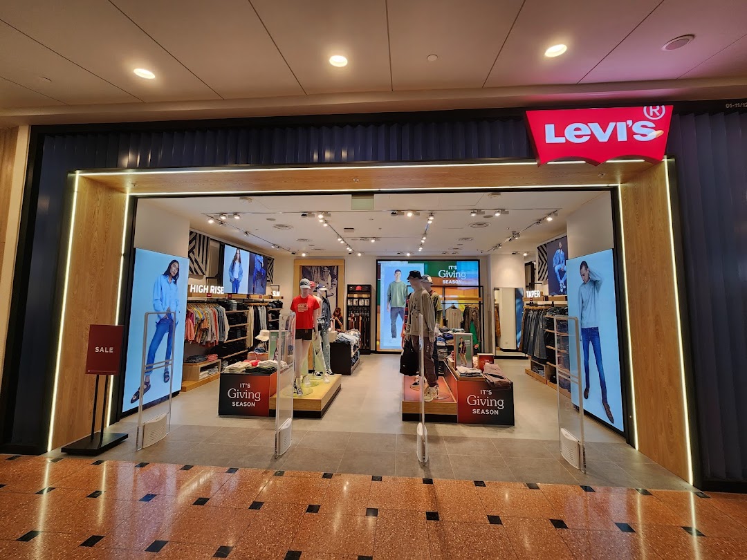 The inviting entrance of a modern Levi's store showcasing denim and casual apparel.