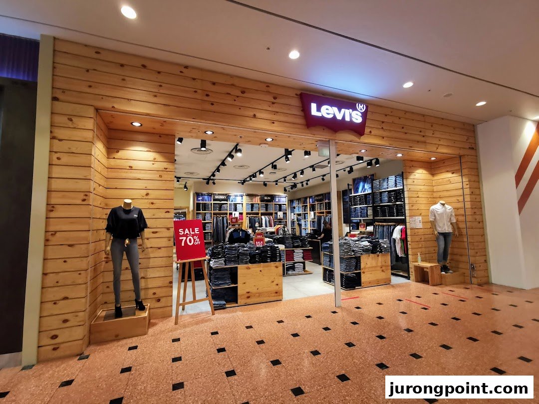 The Levi's store entrance features wooden paneling, mannequins, and a prominent 'Sale 70% Off' sign.