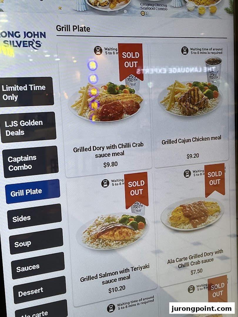 A digital menu board displaying grilled seafood and chicken meals with prices at Long John Silver's.
