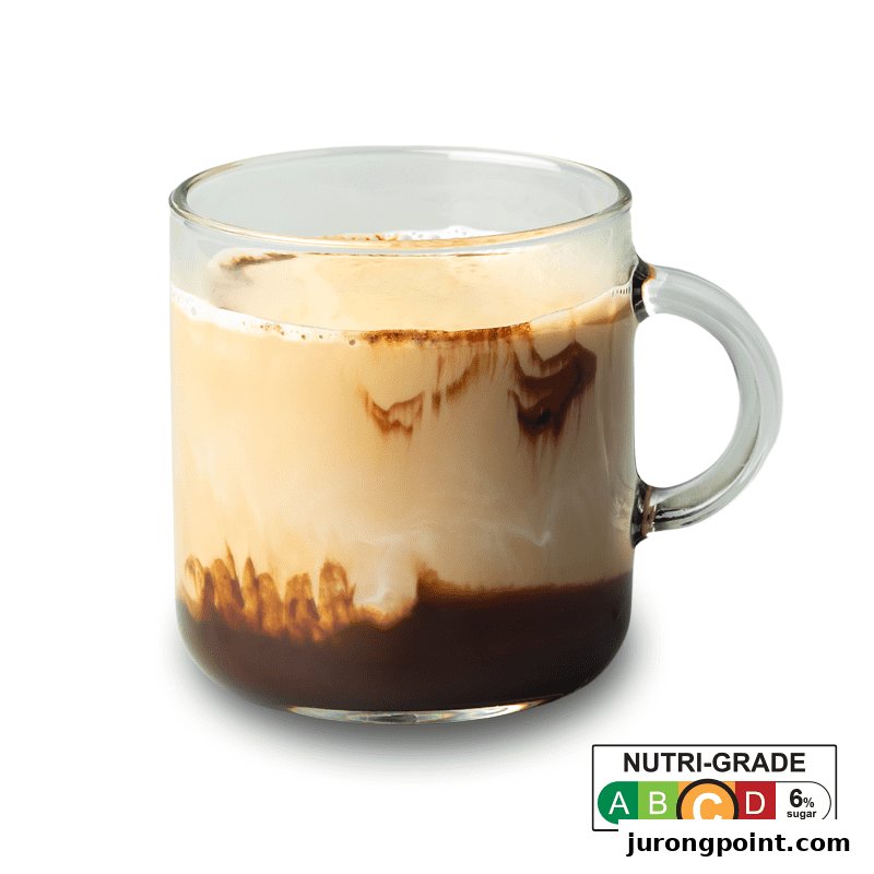 A clear glass mug holds a layered coffee or chocolate drink with cream and a Nutri-Grade label.