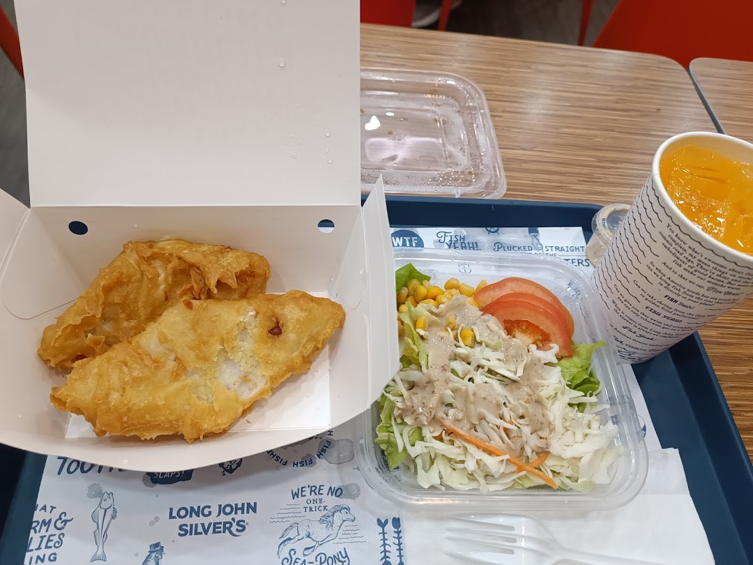A delicious meal from Long John Silver's featuring fried fish, a fresh salad, and a refreshing drink.