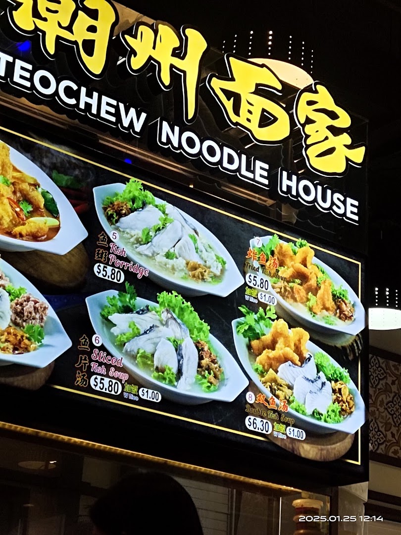 A bright menu board showcasing various fish dishes from Teochew Noodle House.