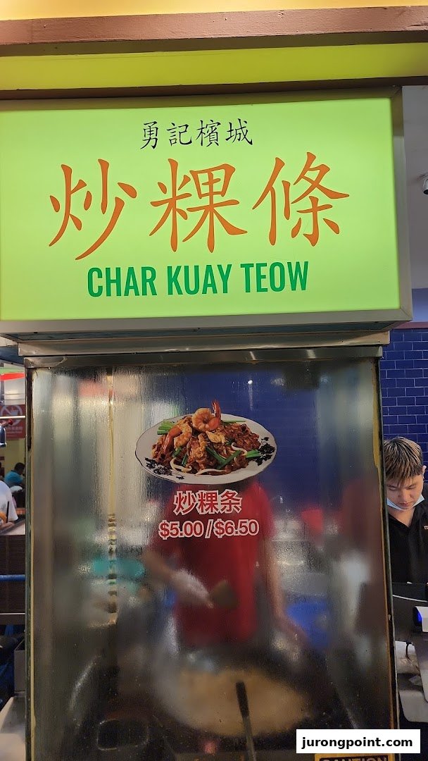 A food stall sign displaying Char Kuay Teow with its image and prices at Malaysia Boleh!.