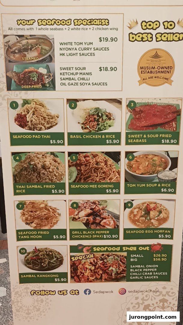A vibrant menu displaying a variety of Malaysian and Thai seafood and noodle dishes with prices.