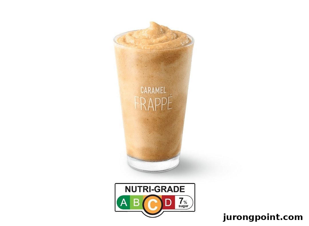 A refreshing McDonald's Caramel Frappé beverage with a Nutri-Grade C label, indicating 7% sugar.