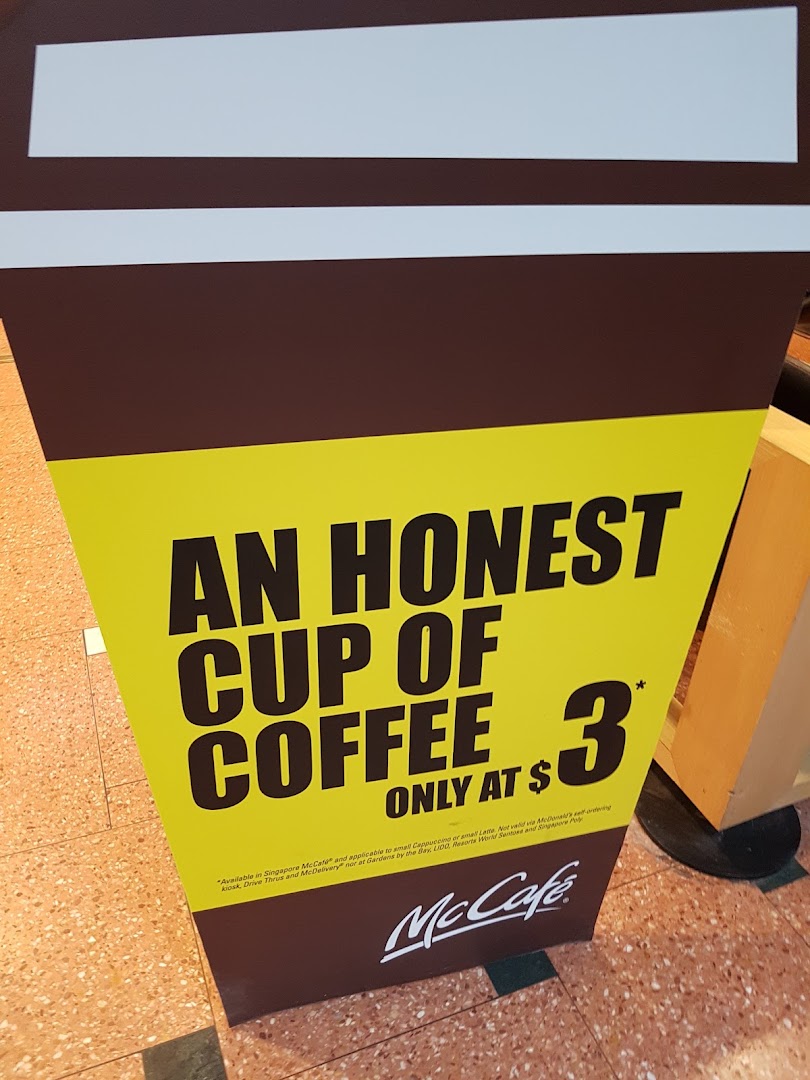 A McCafé standee promoting an 'honest cup of coffee' for $3.