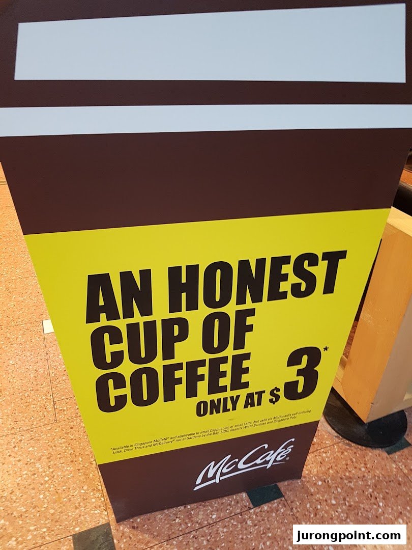 A McCafé standee promoting an 'honest cup of coffee' for $3.