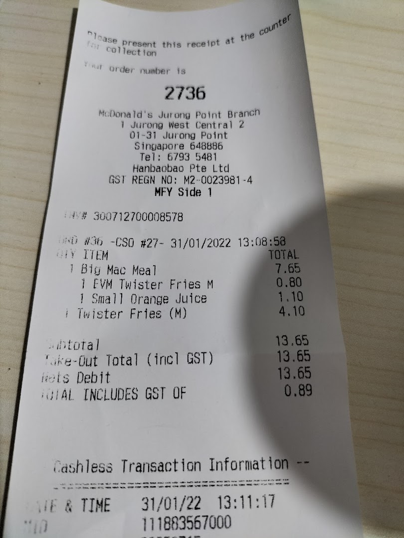 A detailed close-up of a McDonald's receipt from the Jurong Point Branch.