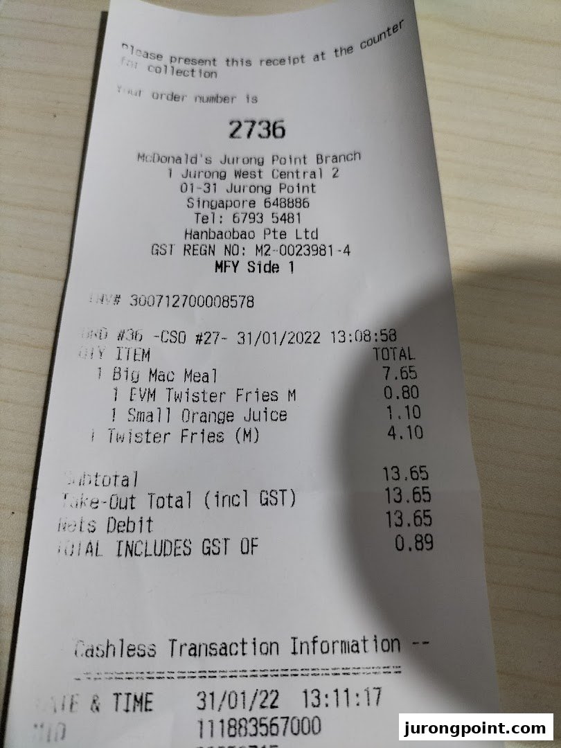 A detailed close-up of a McDonald's receipt from the Jurong Point Branch.