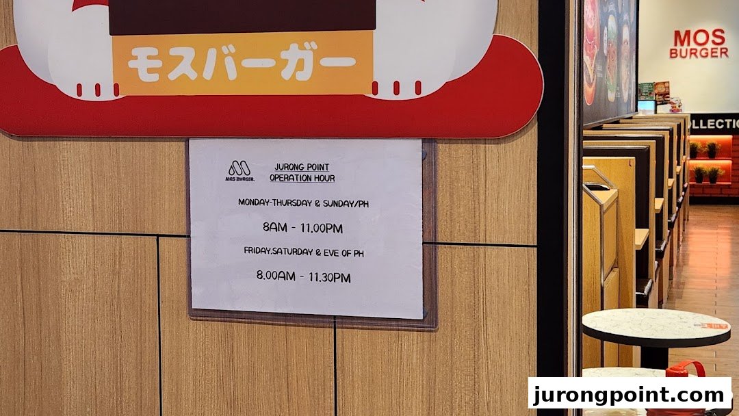 The entrance of MOS Burger at Jurong Point, displaying its operating hours.
