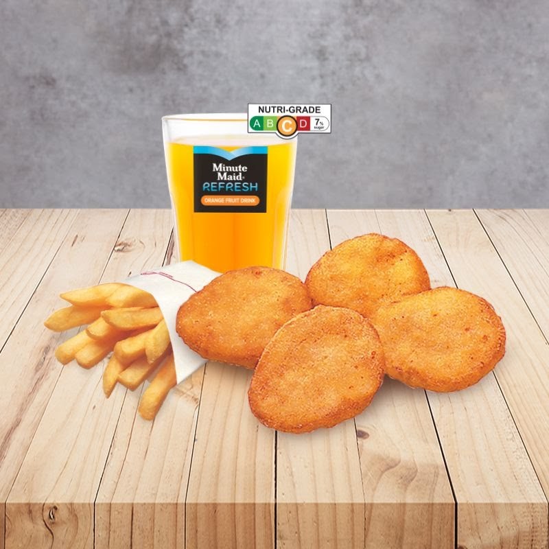 A combo meal featuring golden fries, crispy nuggets, and a refreshing Minute Maid orange drink on a wooden table.