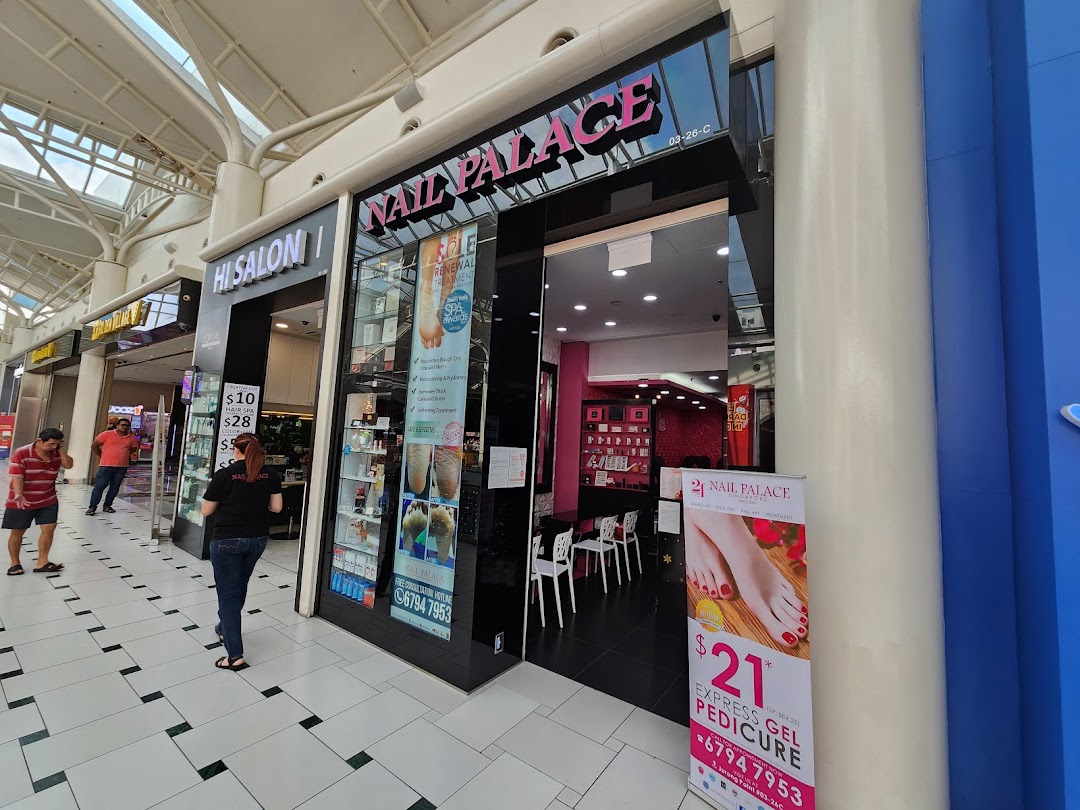Exterior view of Nail Palace and Hi Salon, showcasing their entrances and promotional offers.