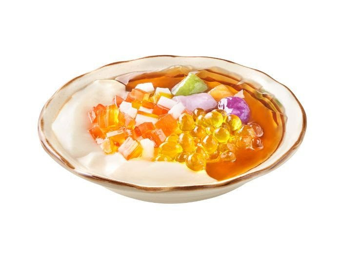 A vibrant bowl of Taiwanese dessert featuring a base with various colorful toppings like jelly cubes and popping pearls.