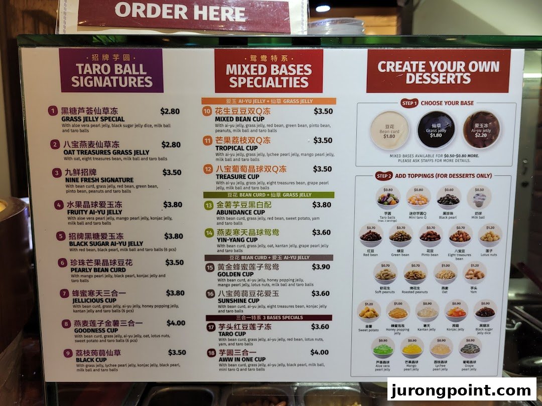 A detailed menu board displaying various Taiwanese desserts, including taro ball signatures and custom options.