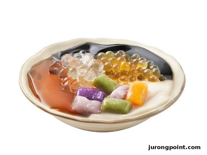 A vibrant bowl of Taiwanese dessert featuring various toppings like taro balls, pearls, and grass jelly.