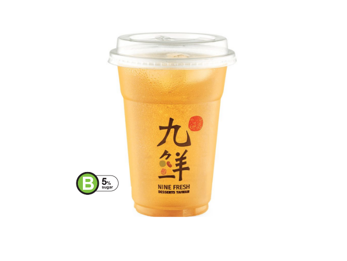 A clear plastic cup filled with an amber-colored drink, branded 'Nine Fresh Desserts Taiwan', with a 'B 5% sugar' label.