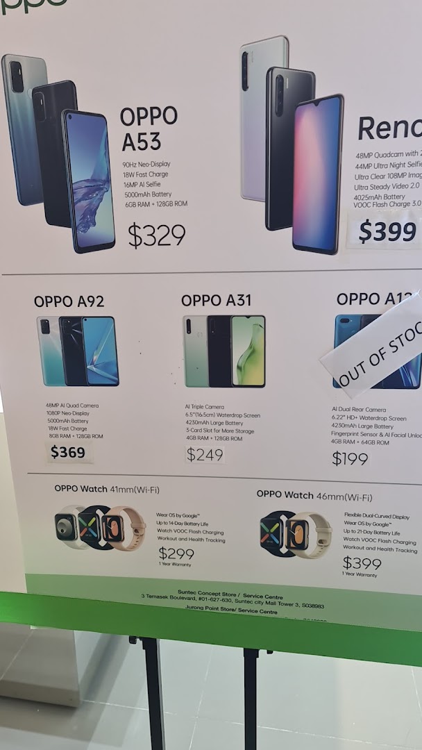A detailed display board showcasing various OPPO smartphones and smartwatches with specifications and prices.