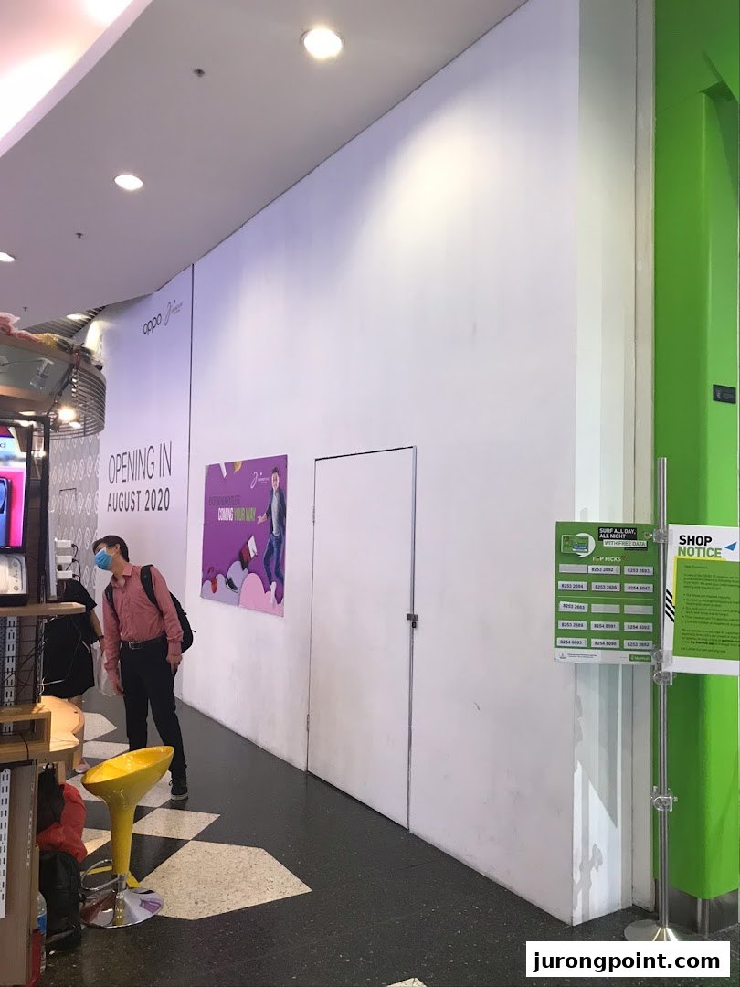 Hoarding for the upcoming OPPO Concept Store, announcing its August 2020 opening.