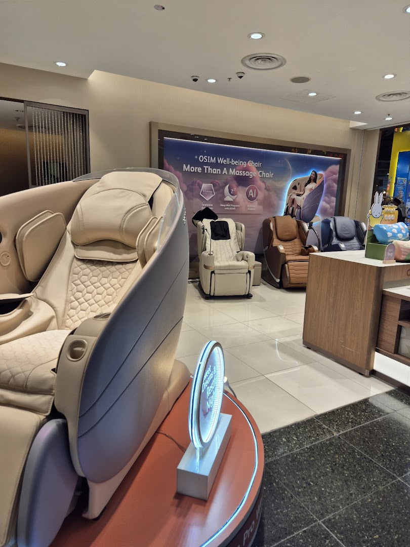 Interior view of an OSIM store showcasing various modern massage chairs and wellness products.