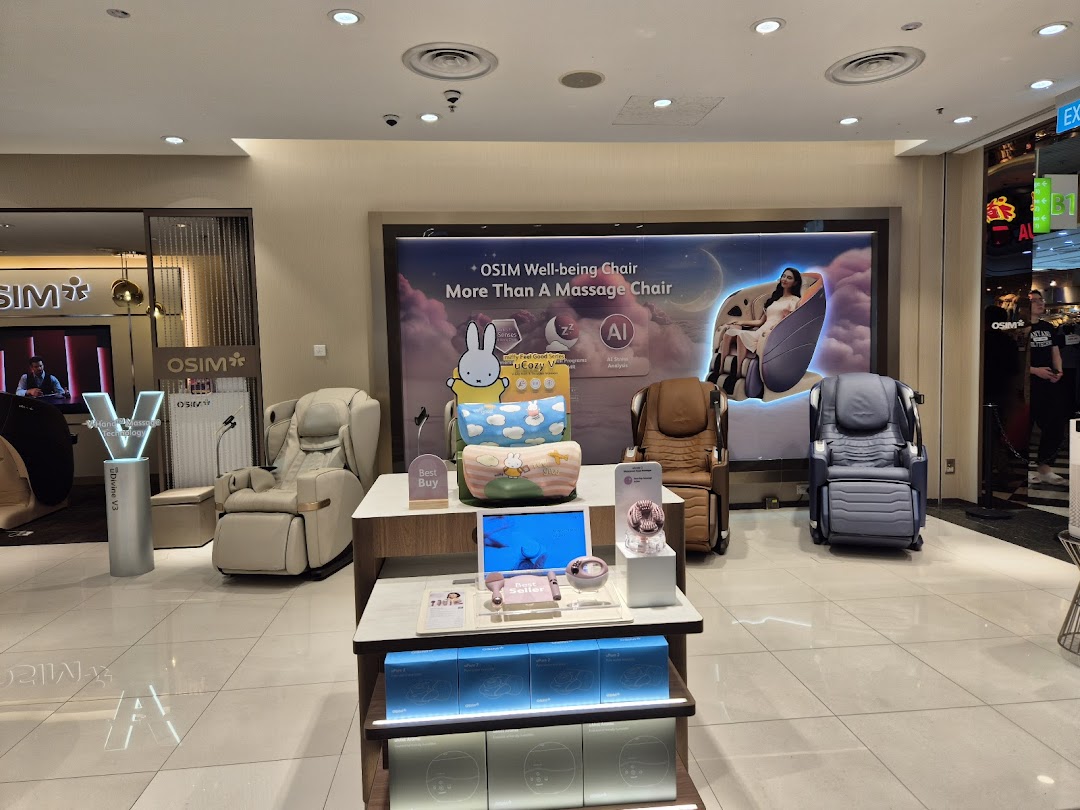 An interior view of the OSIM store showcasing various massage chairs and wellness products.