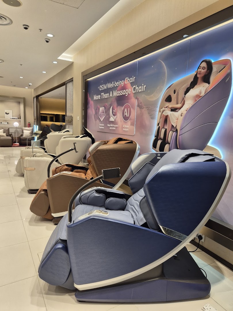 A showroom display of various OSIM massage chairs, highlighting advanced wellness technology.