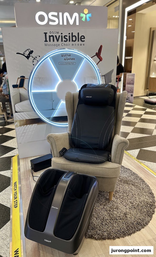 OSIM display featuring an 'Invisible Massage Chair' pad and a foot massager.