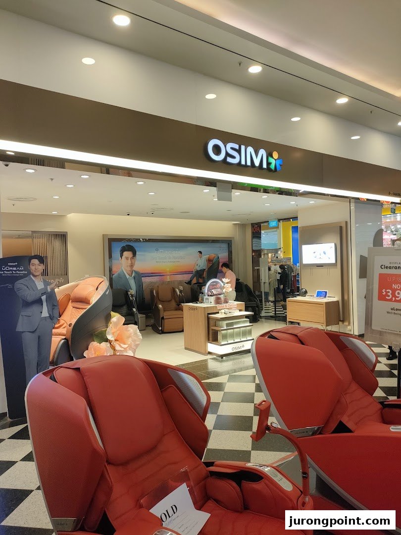 The OSIM store entrance showcasing various massage chairs and wellness products.