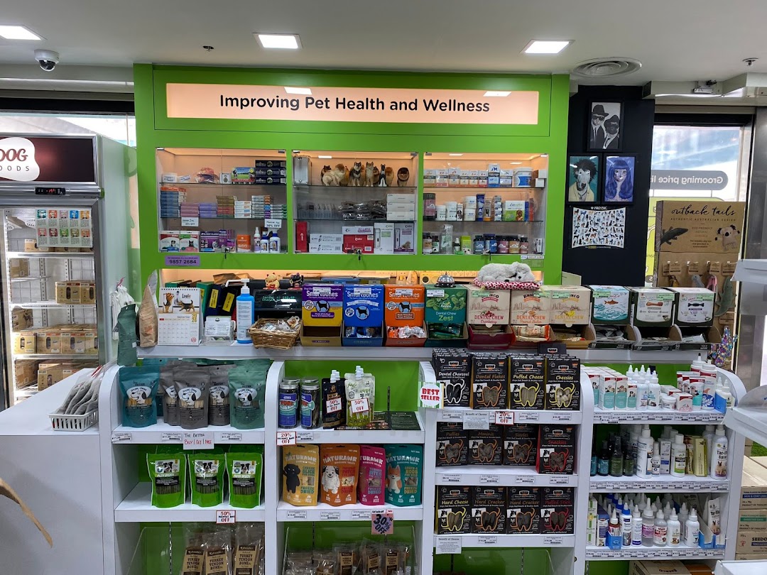 An interior view of Pets Station, showcasing shelves filled with pet health, food, and wellness products.