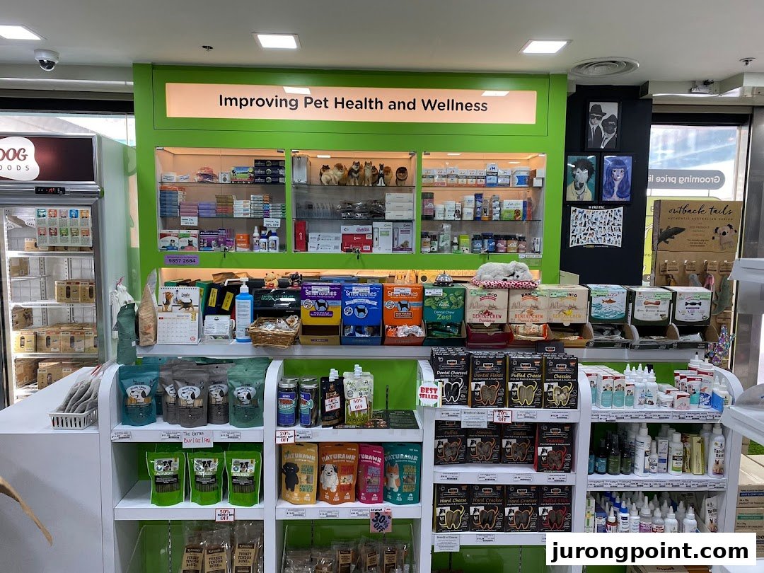 An interior view of Pets Station, showcasing shelves filled with pet health, food, and wellness products.