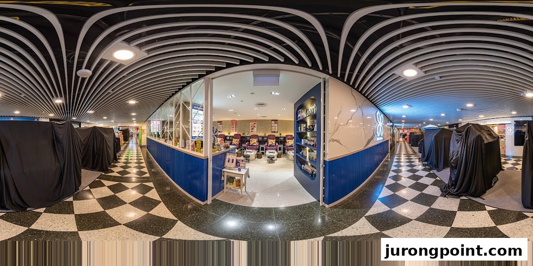 The inviting entrance of Pixie Nail Spa, showcasing comfortable pedicure chairs and a clean, modern interior.