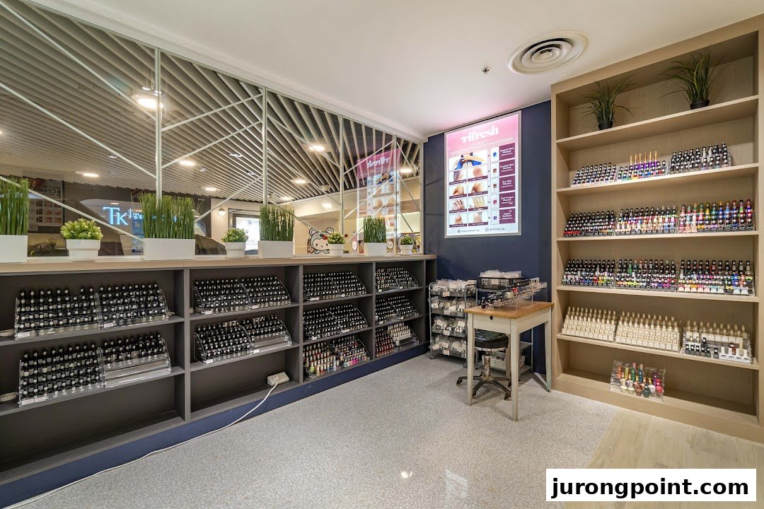 Interior view of Pixie Nail Spa showcasing extensive nail polish collections and a clean, inviting space.
