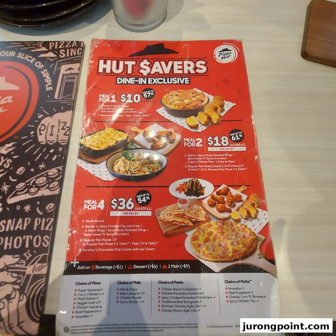 A Pizza Hut menu displaying 'Hut $avers' dine-in exclusive meal deals and various food choices.