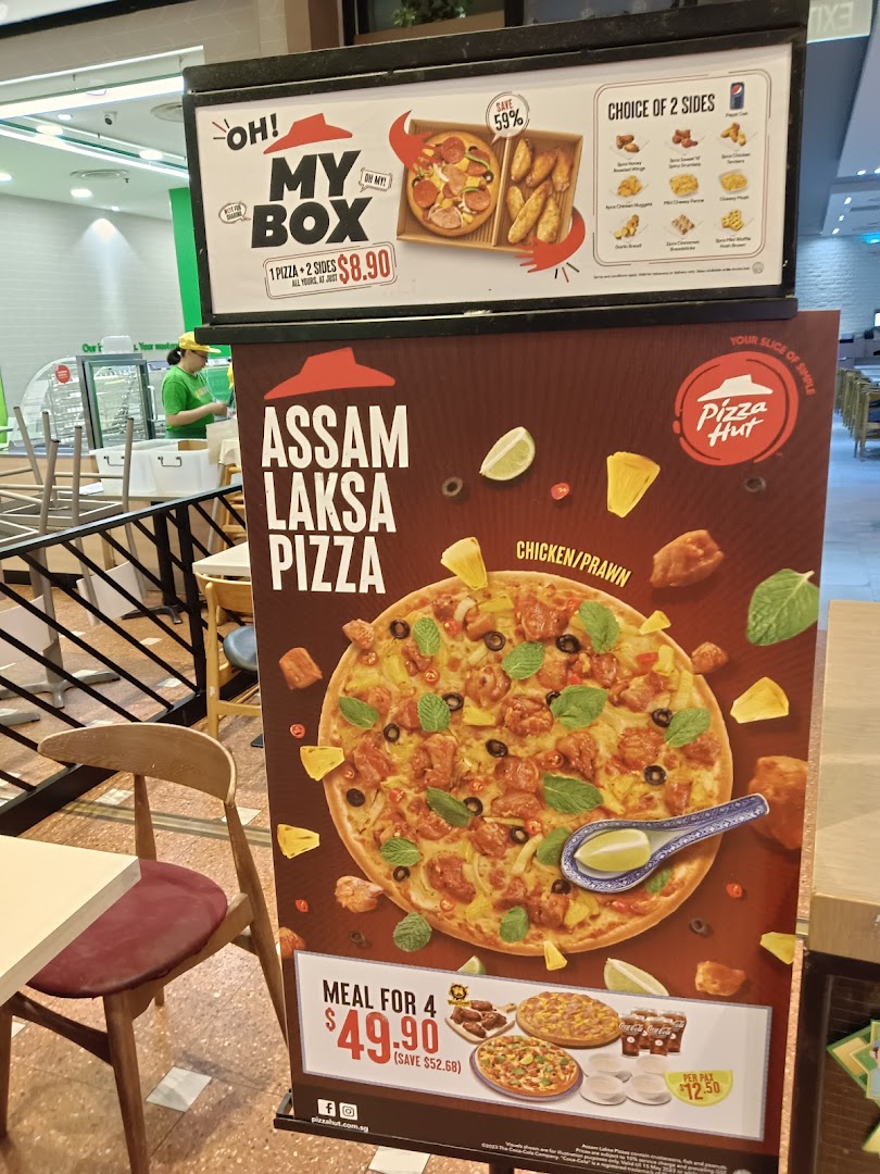 Promotional standees for Pizza Hut featuring the Assam Laksa Pizza and a 'My Box' deal.