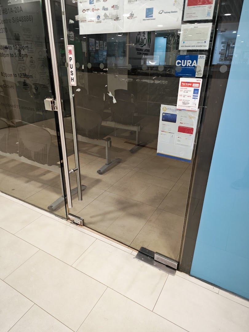 The glass entrance of Point Medical Group Jurong Point, showing operating hours and accepted payment methods.