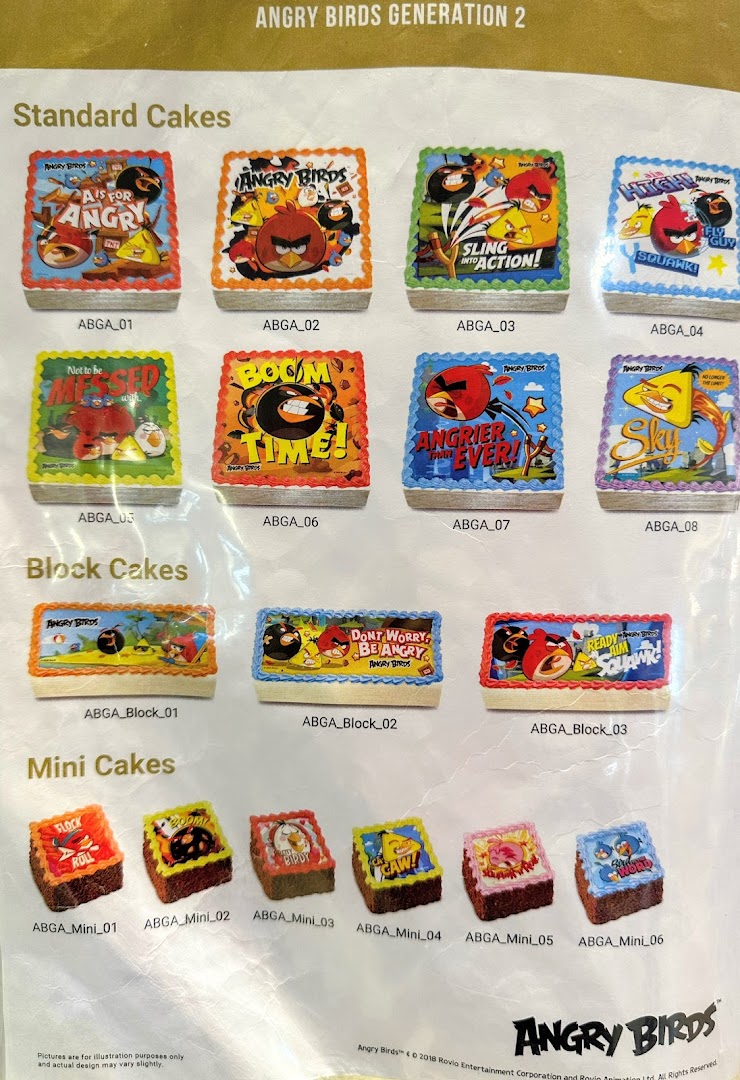 A catalog showcasing various Angry Birds themed cakes, including standard, block, and mini sizes.