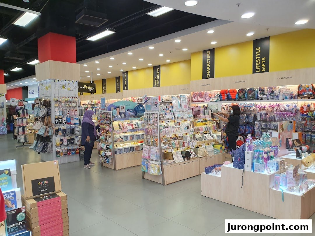 Interior view of POPULAR Bookstore, showcasing diverse stationery, gifts, and character merchandise sections.