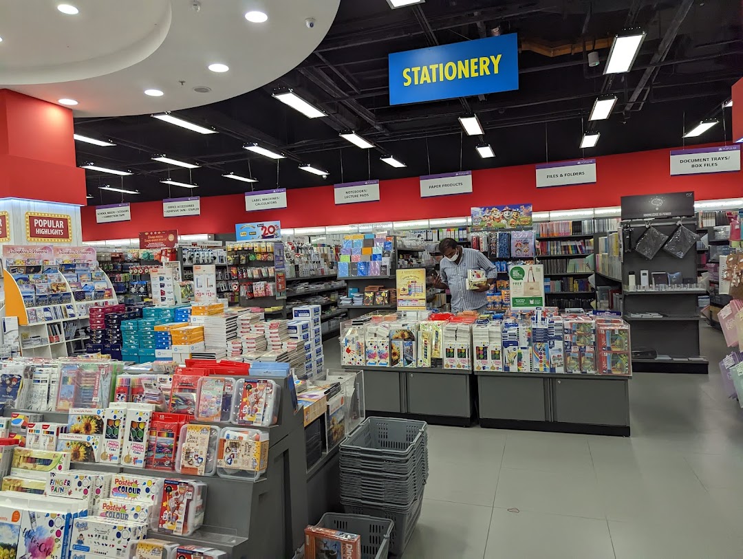 An interior view of POPULAR Bookstore, showcasing a wide array of stationery and books.