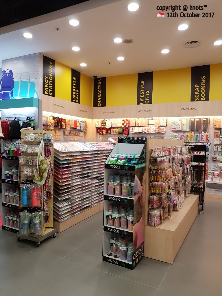 An interior view of POPULAR Bookstore showcasing stationery, gifts, and scrapbooking sections.