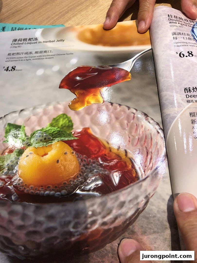 A menu page from PUTIEN showcasing delicious desserts, including Chilled Loquat in Herbal Jelly.