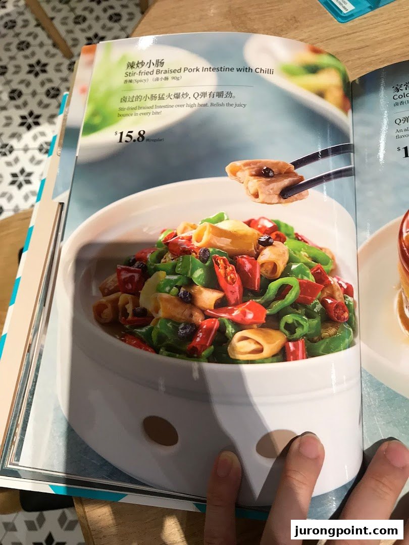 A menu page from PUTIEN showcasing Stir-fried Braised Pork Intestine with Chilli.