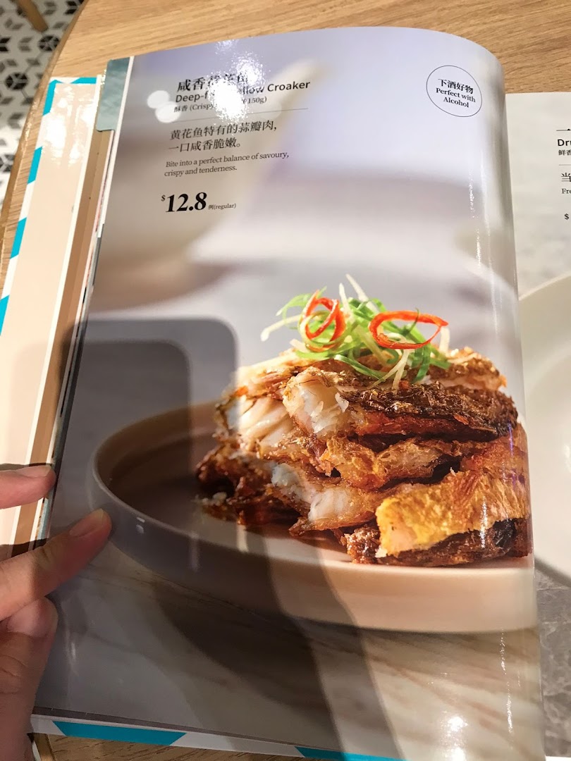 A menu page from PUTIEN featuring a deep-fried yellow croaker dish with its description and price.