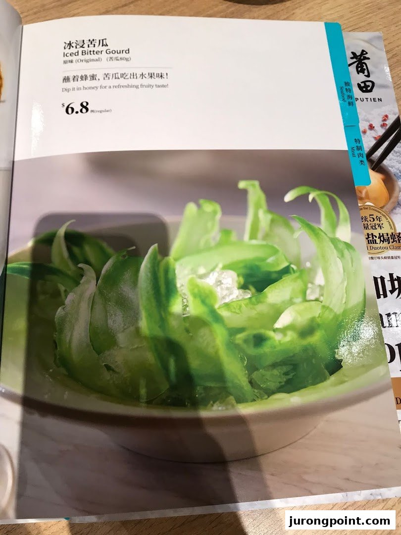 A menu page from PUTIEN featuring Iced Bitter Gourd with price and description.