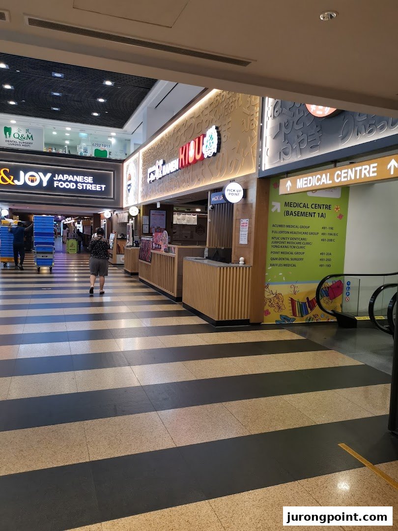 Mall view showing a Japanese food street entrance and a directory for medical services.