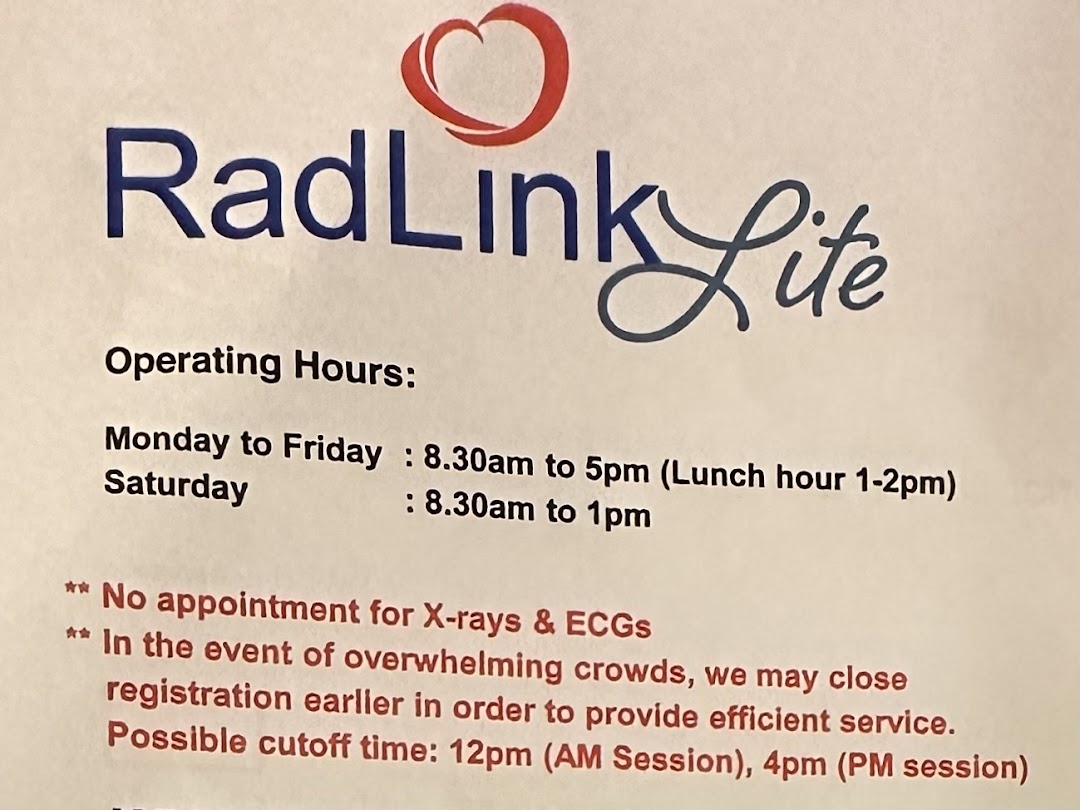 A sign displaying RadLink Lite's operating hours and important service information.